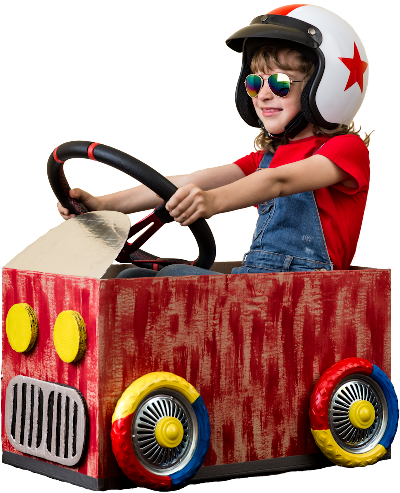 child in cardboard box car